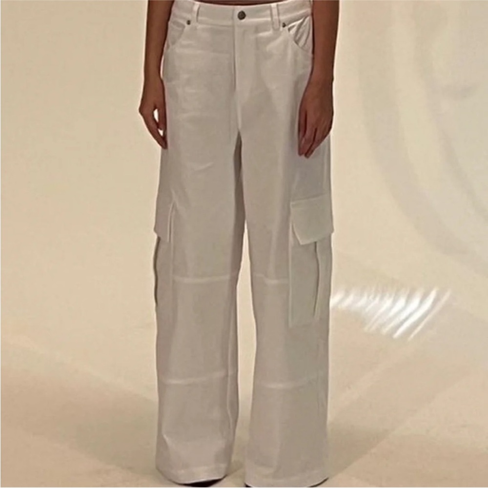 Local European white canvas cargos. Size XL